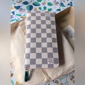 Louis Vuitton white Paris wallet.